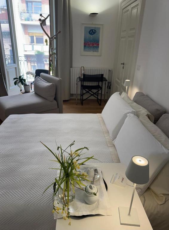 a living room with a couch and a table at B&B 102 in Taranto