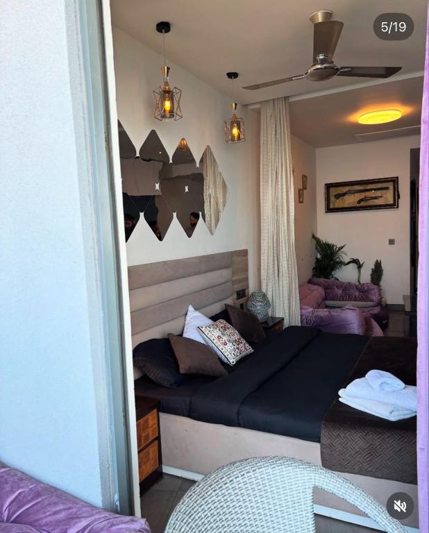 a bedroom with a bed in a room at Noida Stay with Yamuna View in Noida