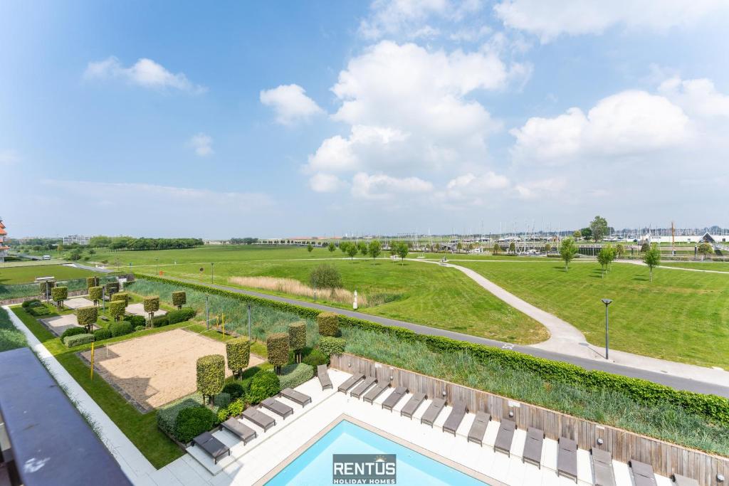 an aerial view of a park with a swimming pool at Seange - with beautiful view and many facilities in Nieuwpoort