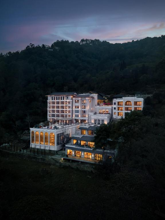 a building with lights on in front of it at Bhangeri Durbar Resort in Nagarkot