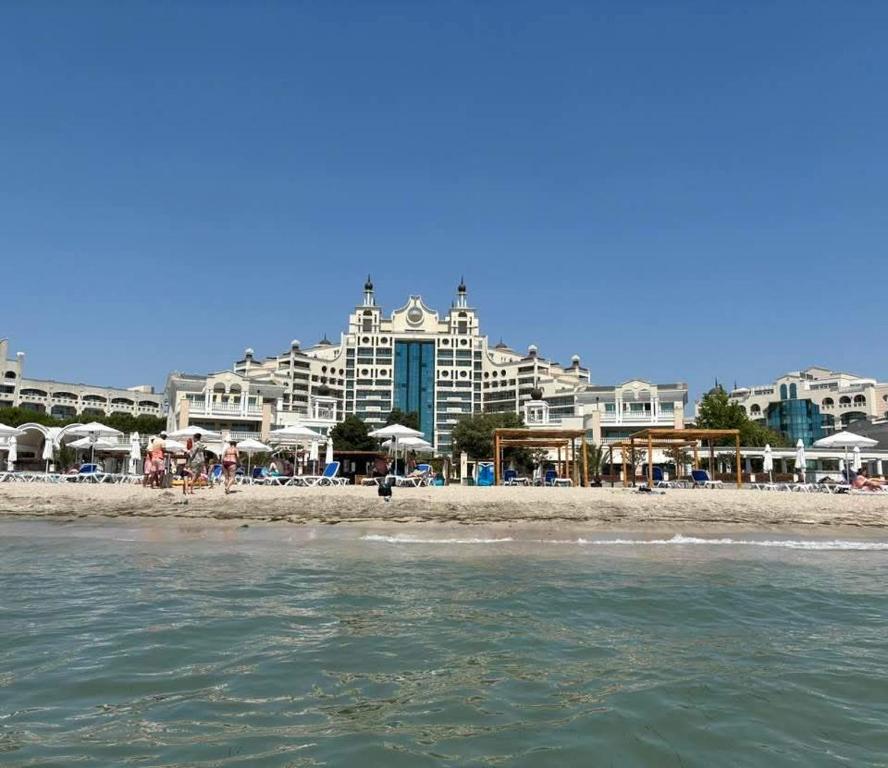 a view of the hotel from the beach at Apartment SunSet rezort - sea wiew in Pomorie