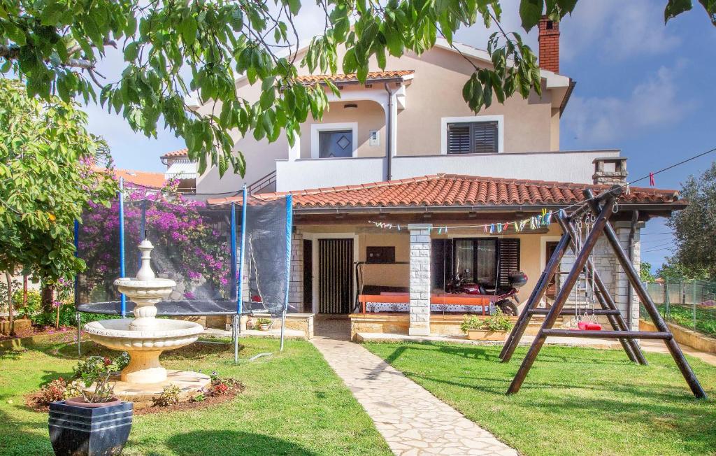 Vonkajšia záhrada v ubytovaní Apartmani Lusi