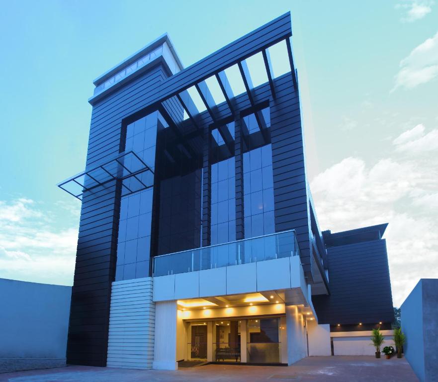 a rendering of a building with a sky at Hotel Indraprastha Thiruvananthapuram in Trivandrum