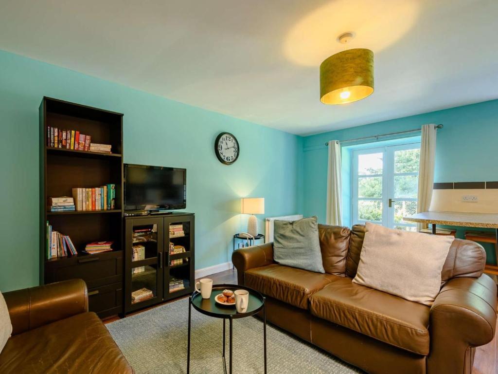 a living room with a couch and a tv at 2 Bed in Sanquhar oc-89402 in Sanquhar