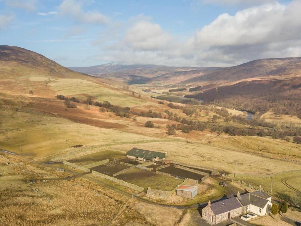 an aerial view of a house in the middle of a field at 2 Bed in Brechin oc-ca300 in Edzell