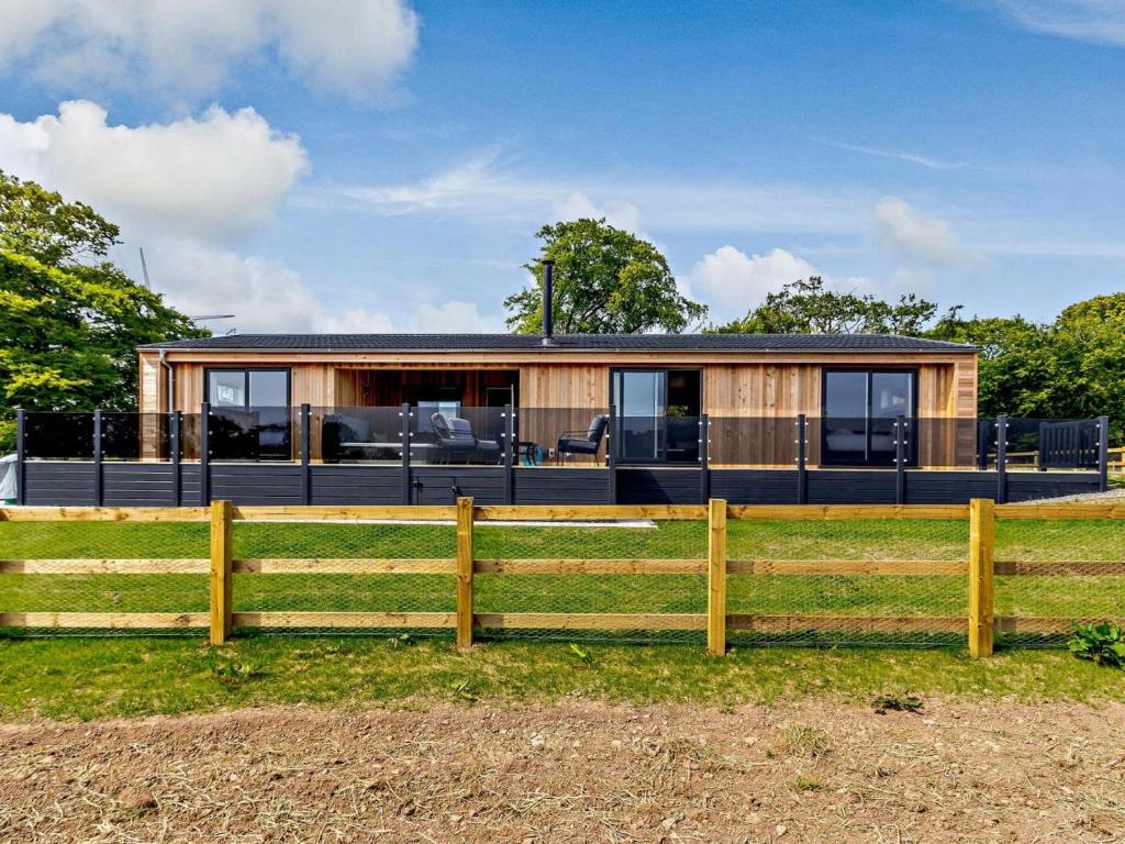 a house with a fence in front of it at 2 Bed in Anstruther oc-83174 in Anstruther