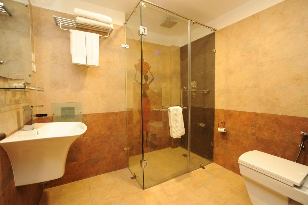 Koupelna v ubytování Traditional Comfort Boutique Hotel