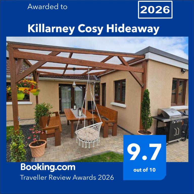 a picture of a patio with a wooden pergola at Killarney Cosy Hideaway in Killarney