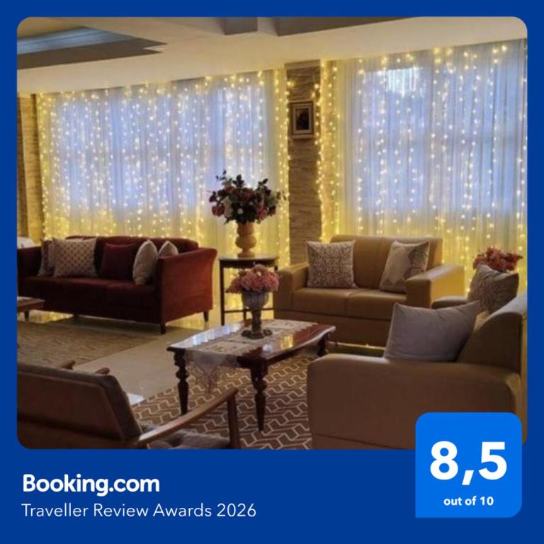 a living room with a lot of lights at Hotel Estância in Poços de Caldas