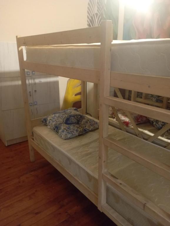 a couple of bunk beds in a room at Хостел Rest Sguear in Almaty