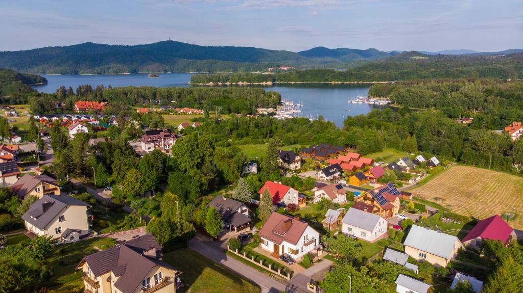 an aerial view of a town next to a lake at Noclegi U Asi in Polańczyk