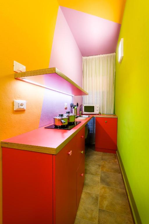 Kuchyň nebo kuchyňský kout v ubytování Hotel Agostini