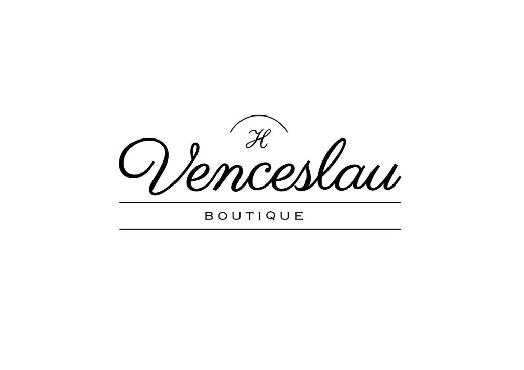 a sign for a vennelau boutique with handwritten text at Venceslau Boutique in Vila do Conde