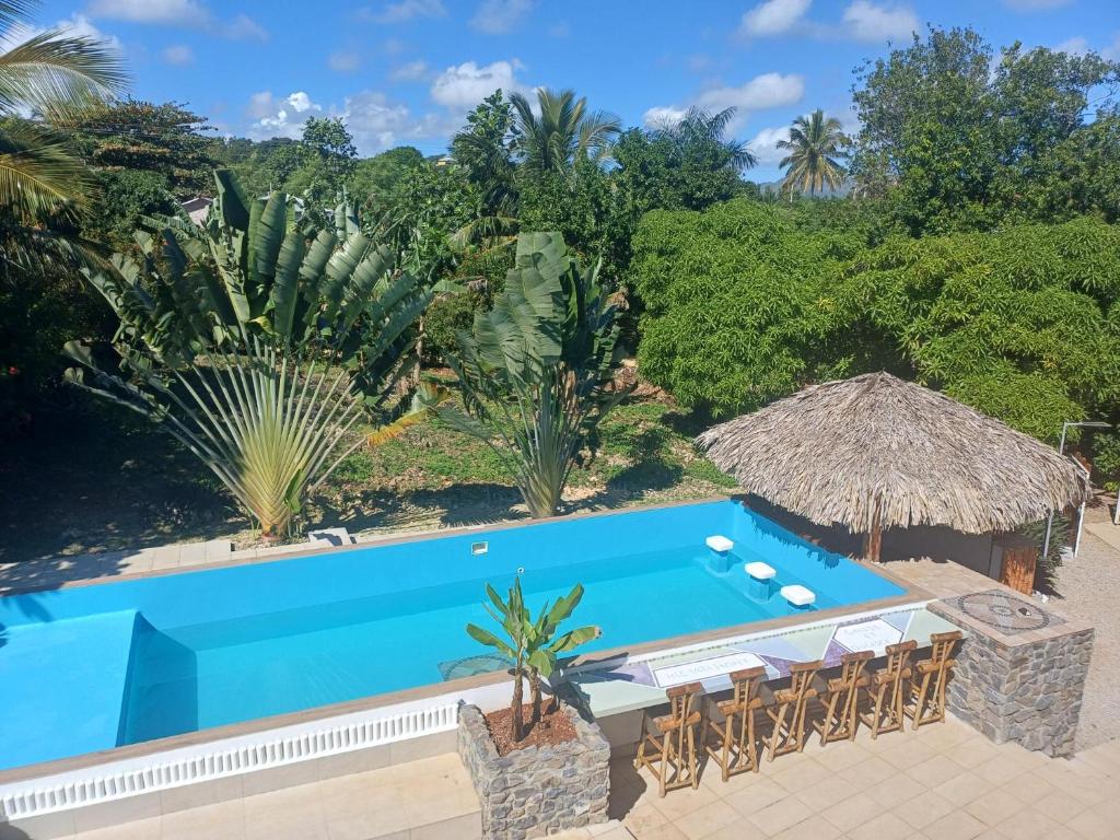 an image of a swimming pool in a resort at Casa Alegiu in Las Galeras