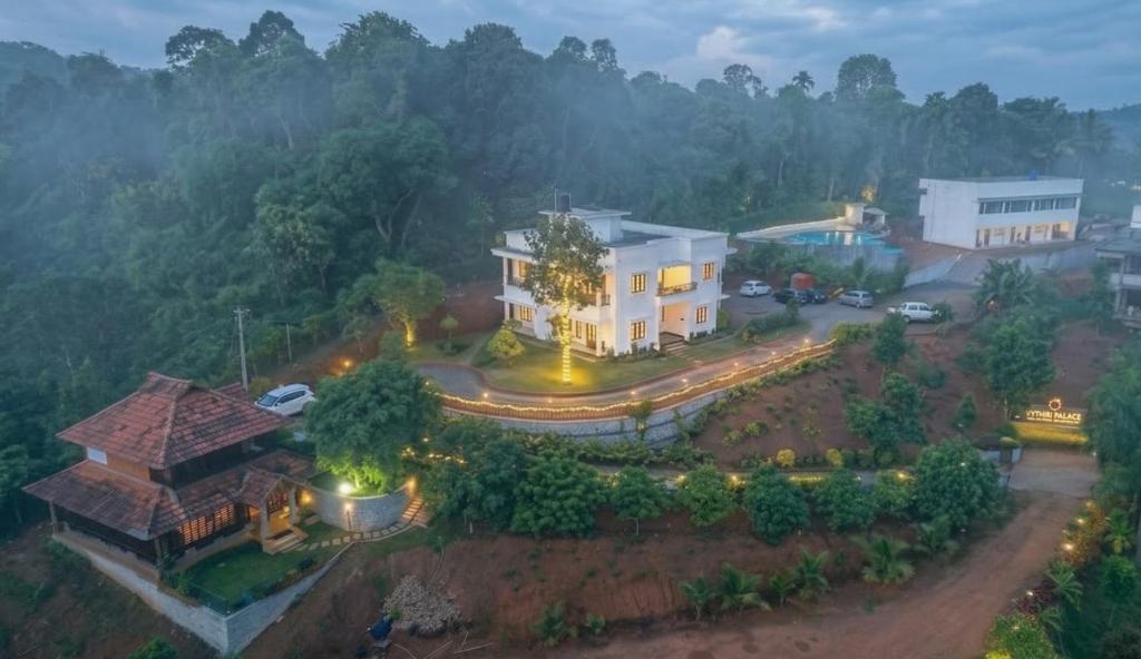 an aerial view of a house with a driveway at Vythiri Palace Wayanad Pool Resort - Mist Climate & India's First Apple Infinity Pool in Vythiri