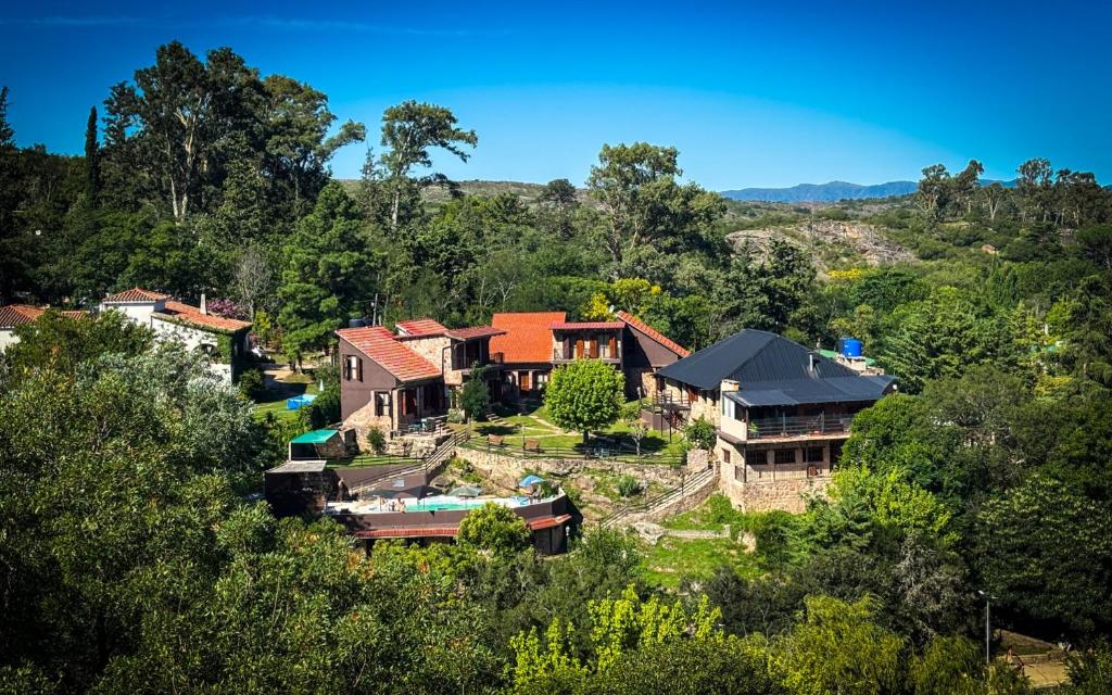 an aerial view of a house in the forest at Finistterra in Tanti