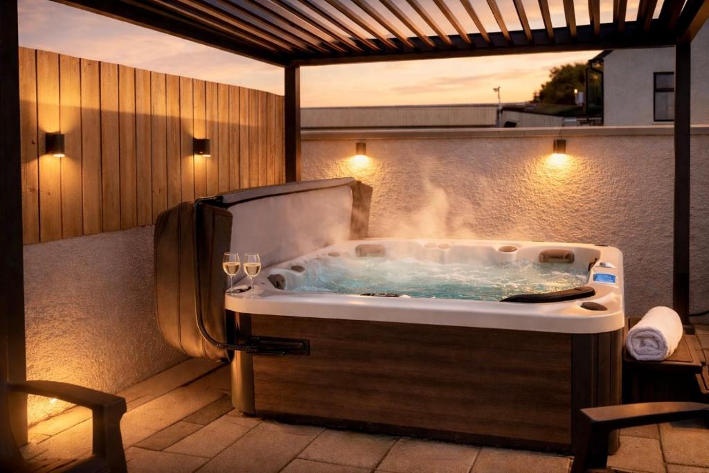 a jacuzzi tub sitting on a roof at Mournes Hot Tub Retreat, 4-Star Accommodation in Newcastle