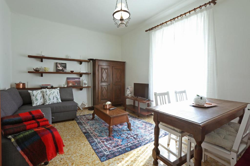 a living room with a couch and a table at La Valletta - Casa di Anna in Menaggio