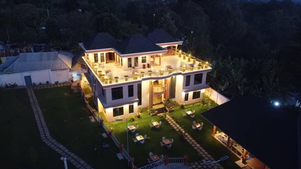 an aerial view of a large house at night at Kilimont Hotel in Mabire