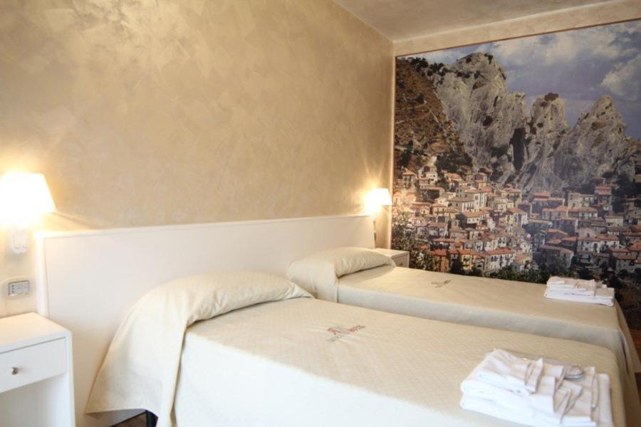 Voodi või voodid majutusasutuse I Rocchi Hotel toas