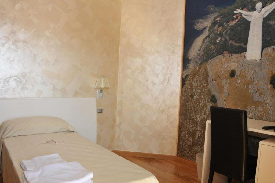 Voodi või voodid majutusasutuse I Rocchi Hotel toas