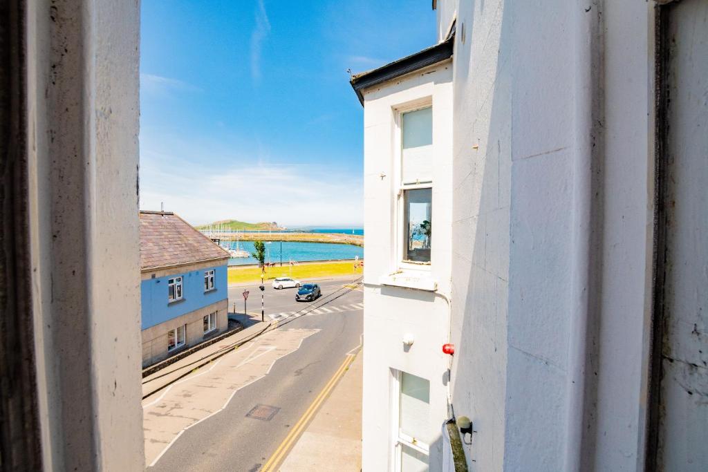 a view of a street from a window of a building at Superb Studio With Marina Views- WiFi Included in Dublin