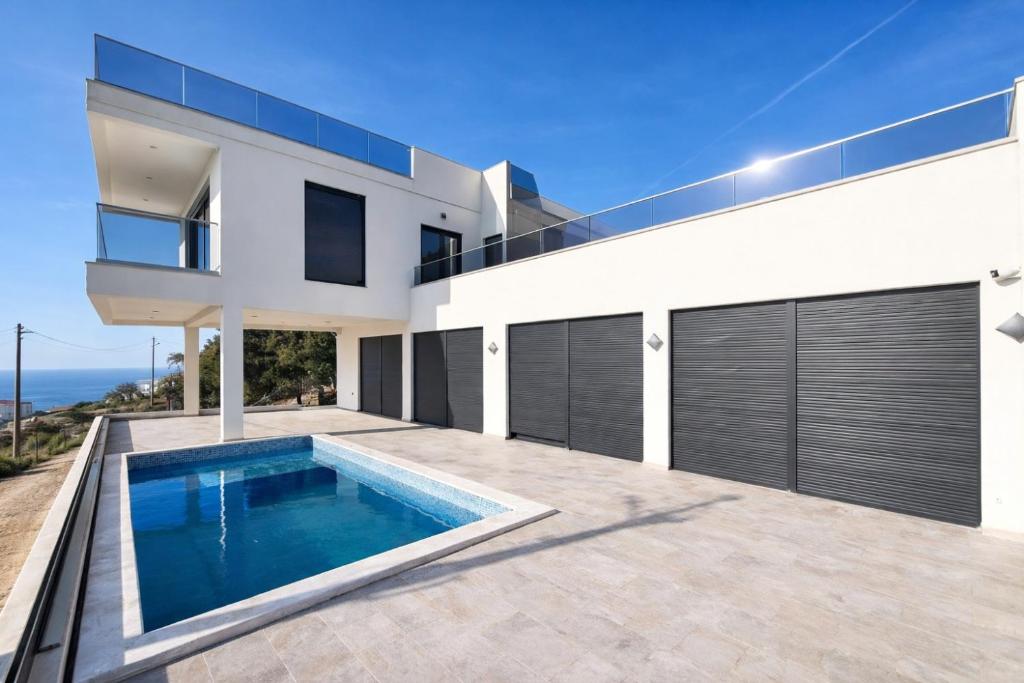 an image of a house with a swimming pool at Vila SOL DEL MAR in Utjeha