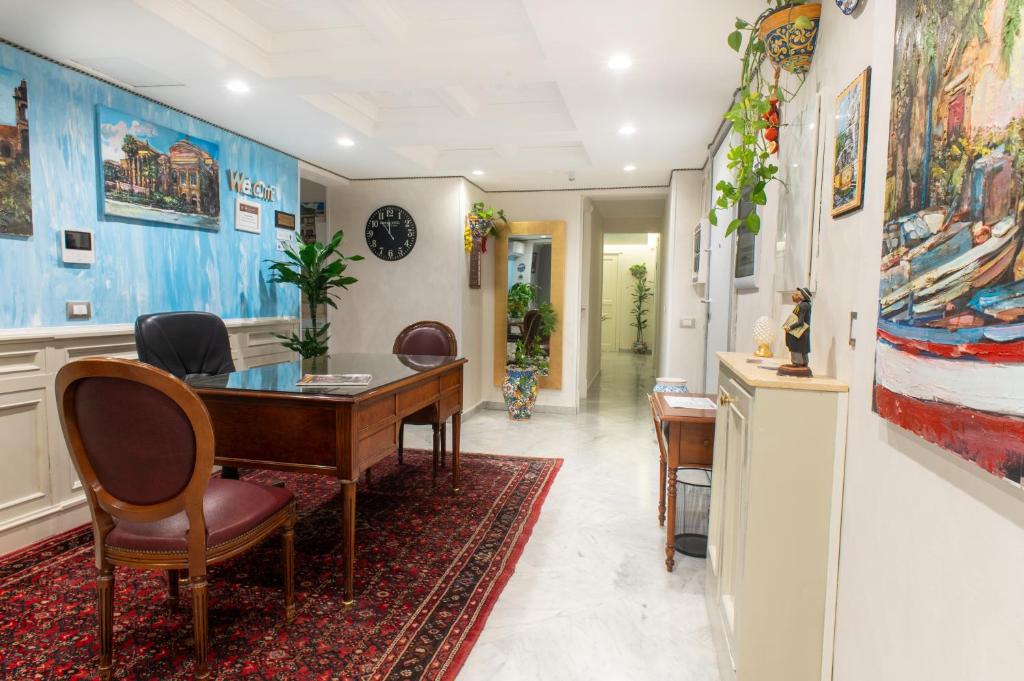 a dining room with a table and chairs at Federico 70 Zaffiro Luxury in Palermo