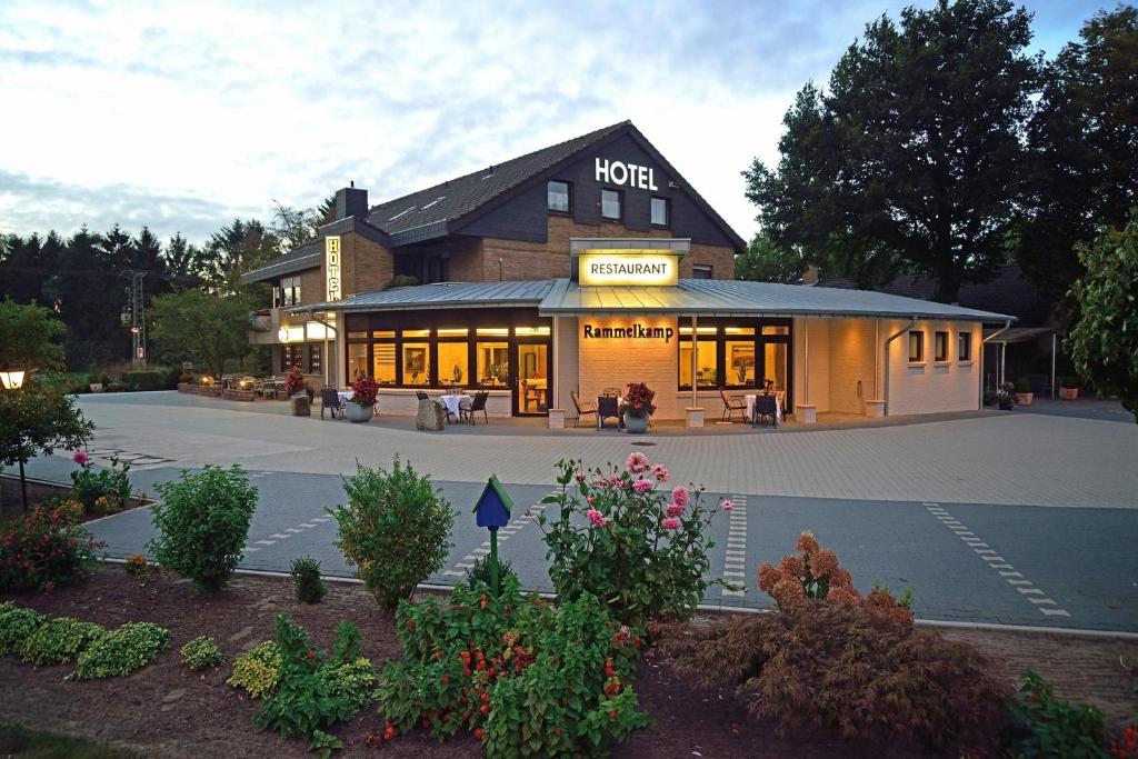 a building with a sign on the front of it at Hotel Rammelkamp in Nordhorn