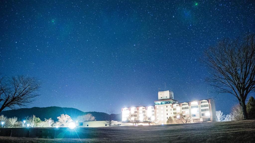 a large building at night with the lights on at グリーンピア三陸みやこ in Miyako