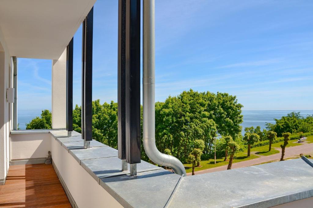 a view from the balcony of a house with windows at Villa Philine - Meerblicksuite "Carlotta" in Ostseebad Sellin