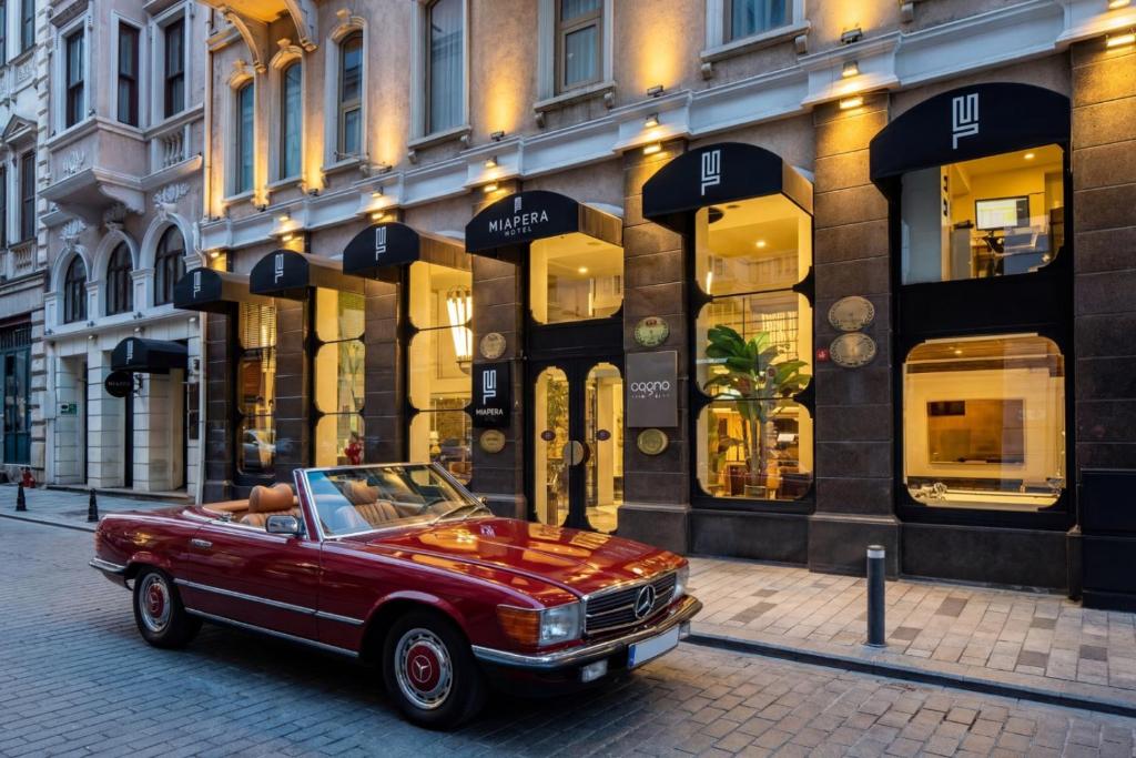 a red car parked in front of a building at Miapera Hotel & Spa - Special Class in Istanbul