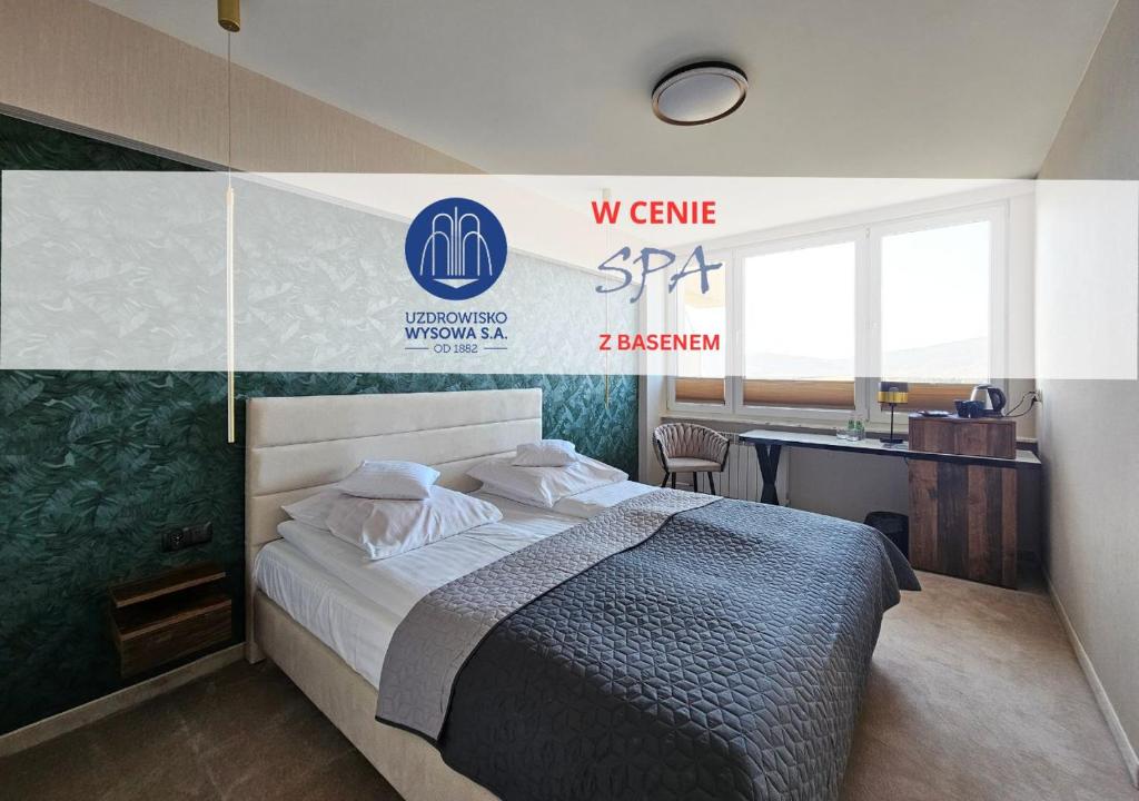 a bedroom with a bed in a room with a sign at Ośrodek Uzdrowiskowy Biawena in Wysowa-Zdrój
