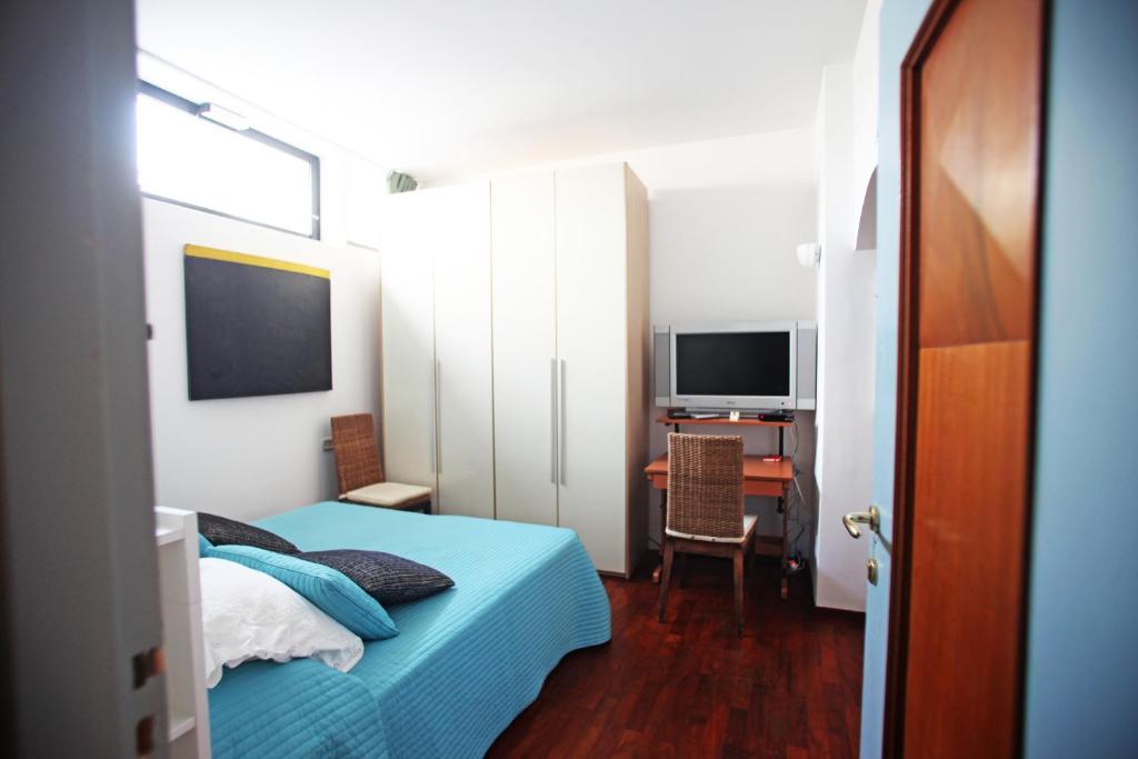 Postel nebo postele na pokoji v ubytování Residenza L'Isola Capri
