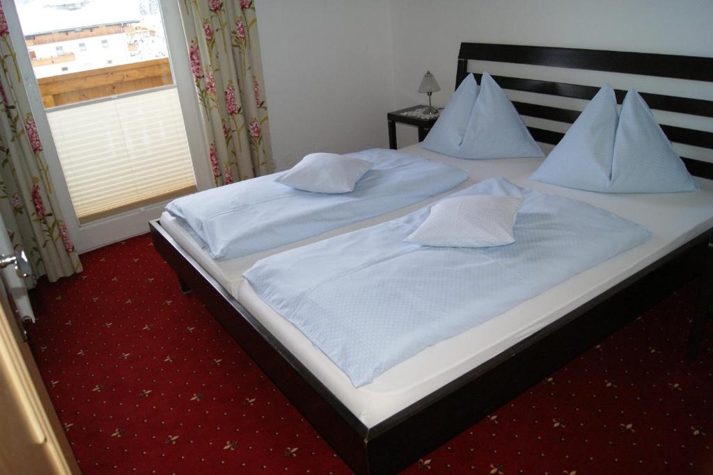 Postel nebo postele na pokoji v ubytování Haus Roswitha