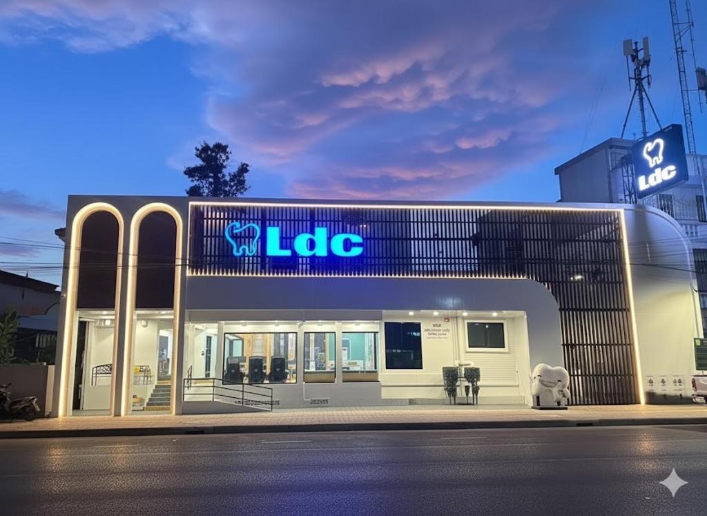 a lg store with a sign on the front of it at Sleep Owl Surat Thani in Surat Thani