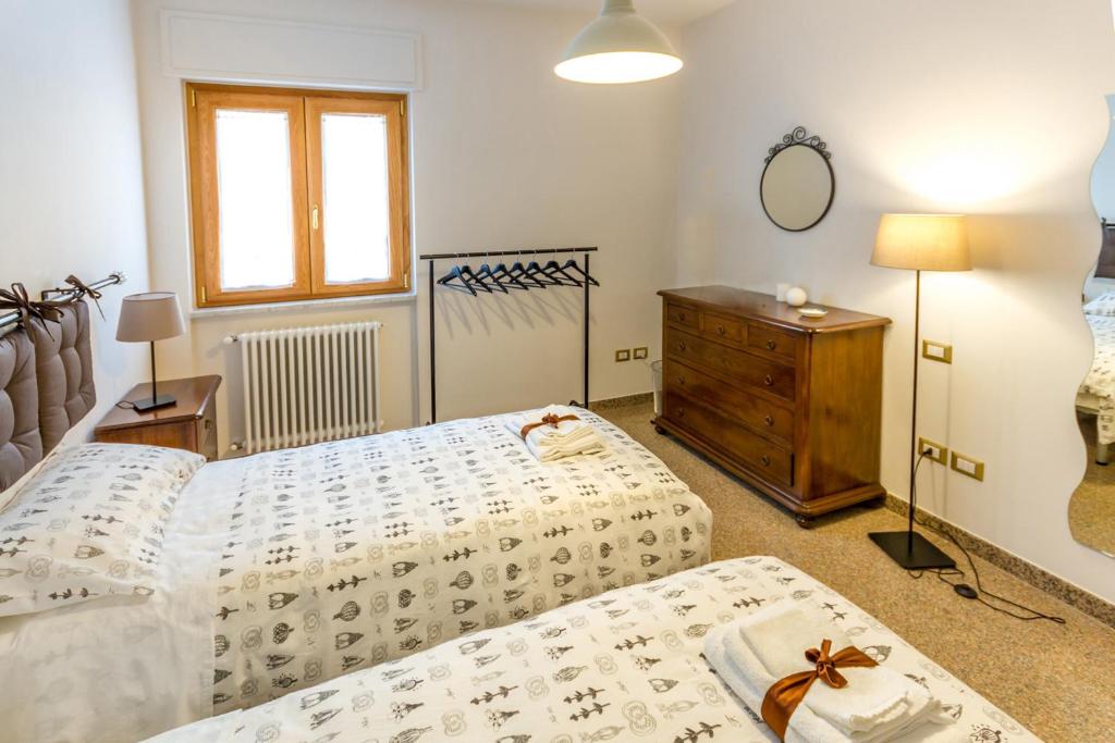 Postel nebo postele na pokoji v ubytování Buon Vento