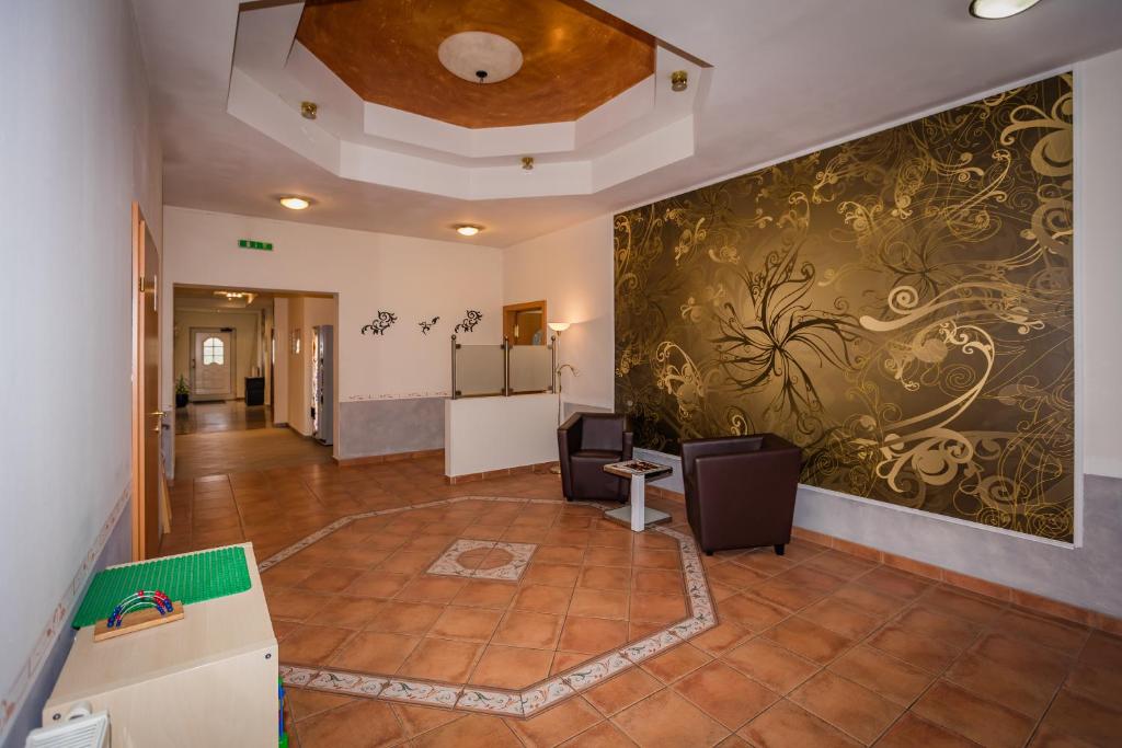 Posezení v ubytování Hotel Denk Bed & Breakfast