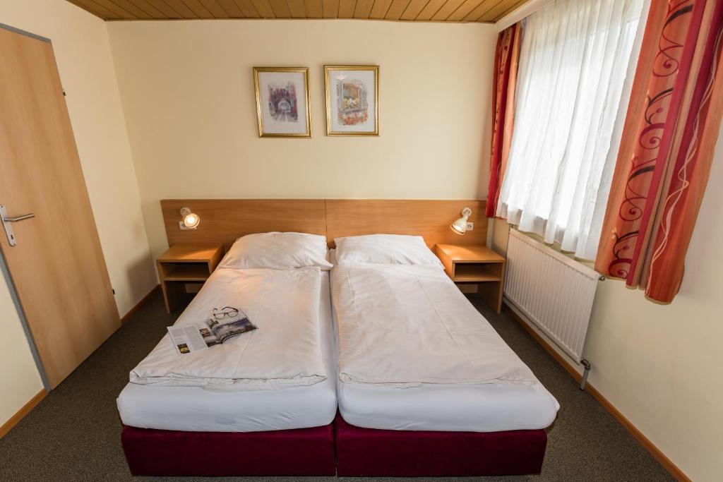 Postel nebo postele na pokoji v ubytování Hotel Denk Bed & Breakfast