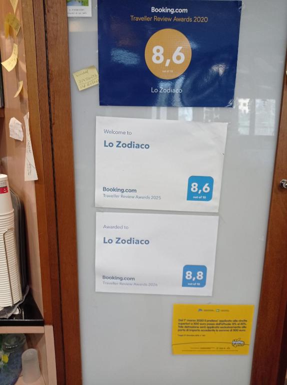 a refrigerator with two boxes on the door at Lo Zodiaco in Roncobillaccio