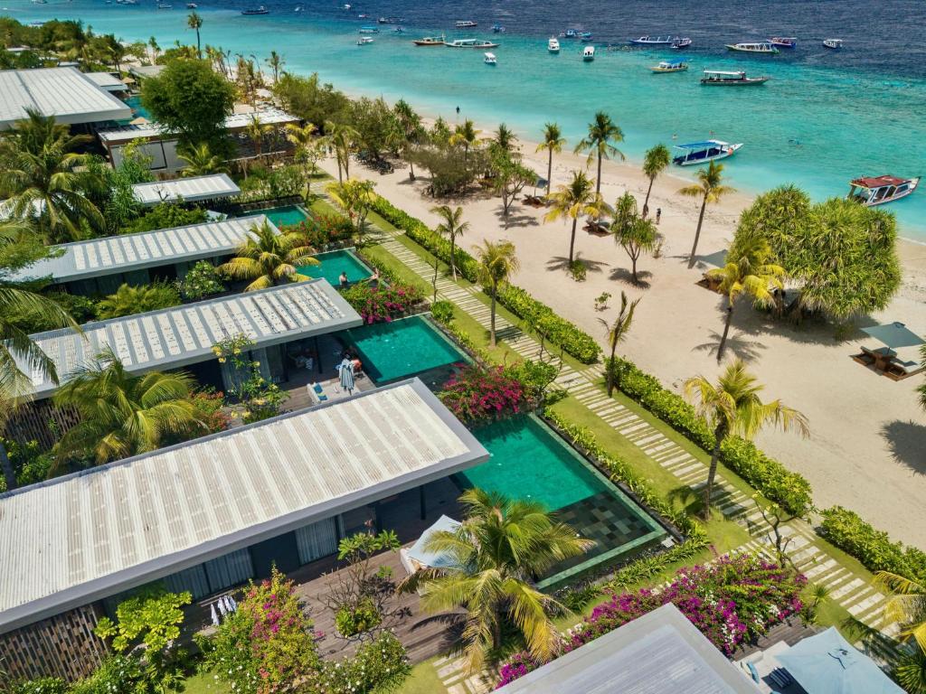an aerial view of the resort and the beach at BASK Gili Meno in Gili Meno