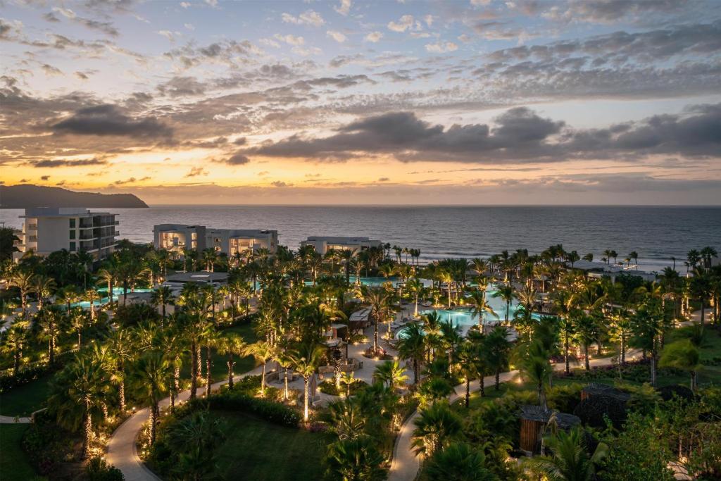 an aerial view of a resort with the ocean at Conrad Punta de Mita in Punta Mita