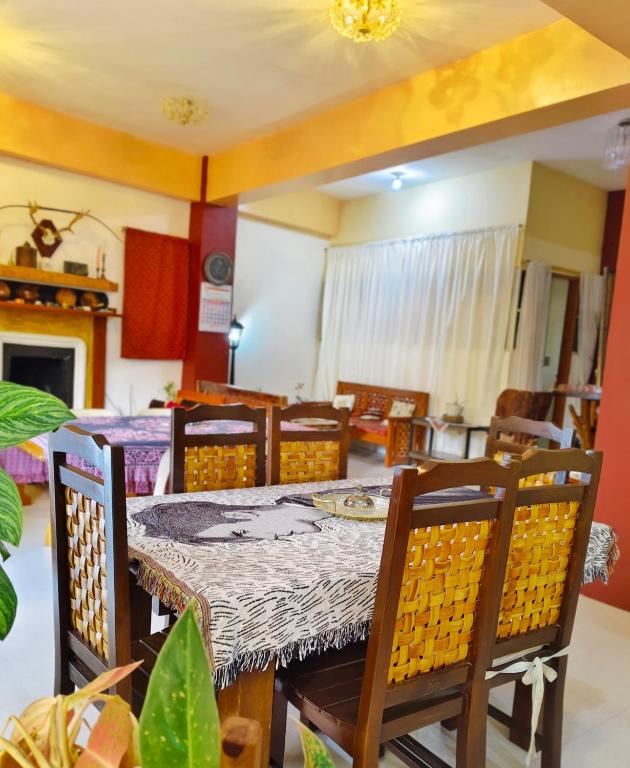 a dining room with a table and chairs at Best Sagada Lodge within City Proper! in Sagada
