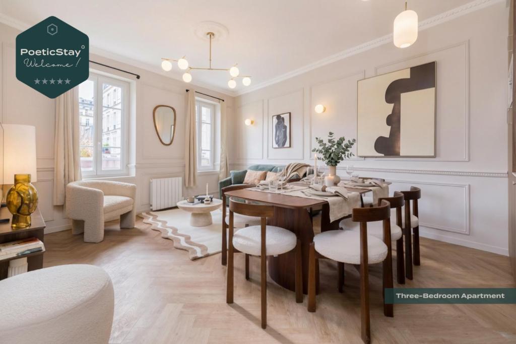 a dining room and living room with a table and chairs at PoeticStay - Neuilly sur Seine - Dulud in Neuilly-sur-Seine