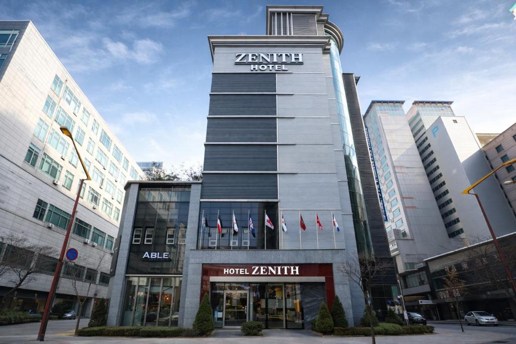 a building with a zermatt jobs sign on it at Zenith Tourist Hotel in Bucheon