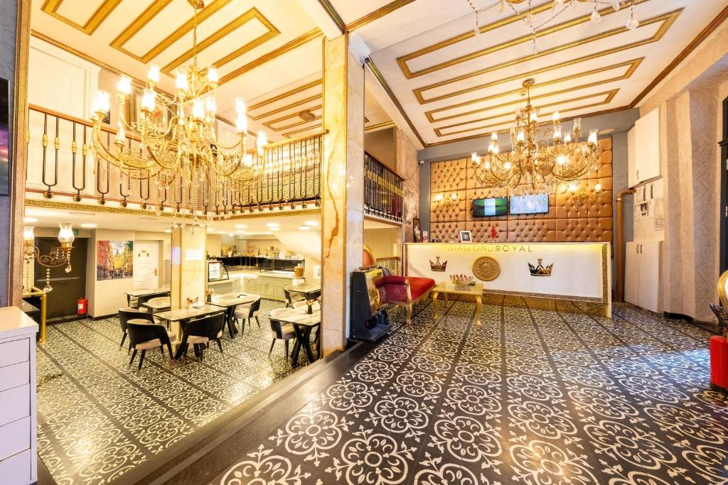 a large living room with a chandelier at Diamond Royal Hotel in Istanbul
