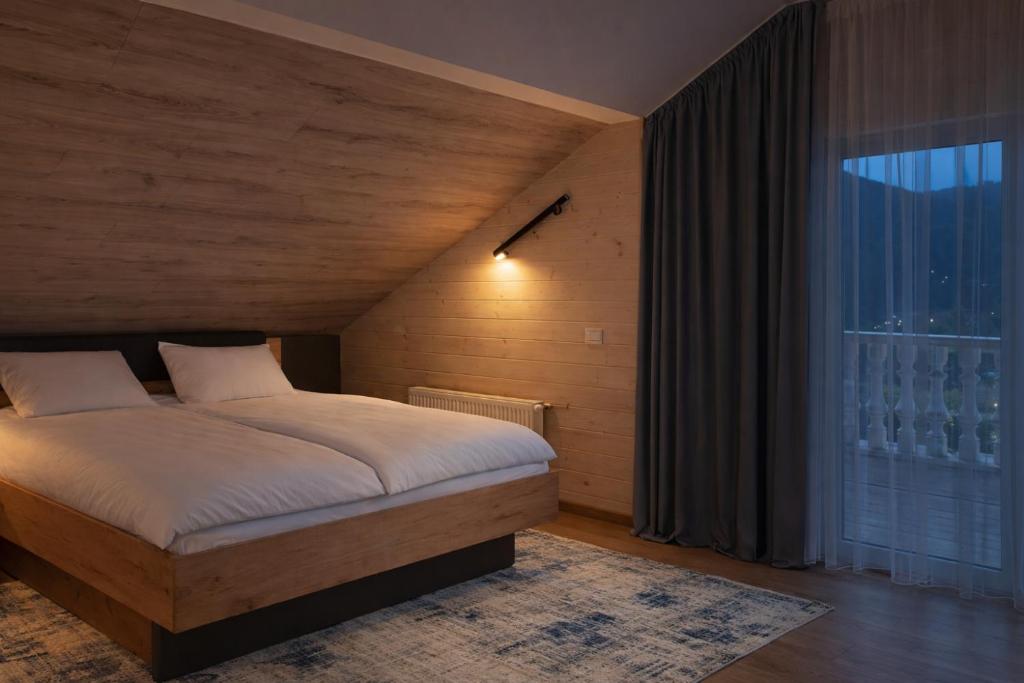 Llit o llits en una habitació de Gorra Hotel