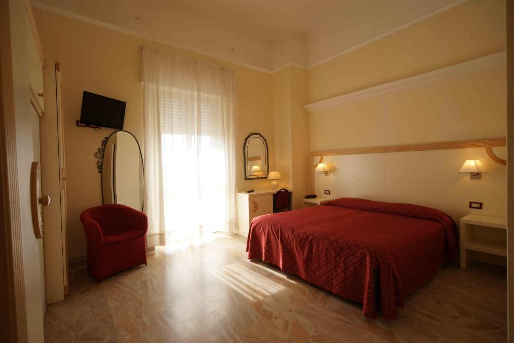 Postel nebo postele na pokoji v ubytování Hotel Liberty