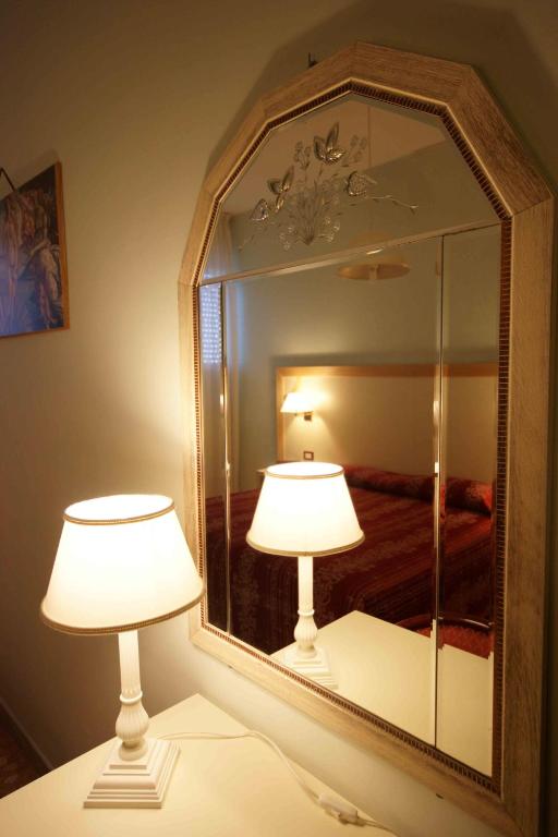 Postel nebo postele na pokoji v ubytování Hotel Liberty