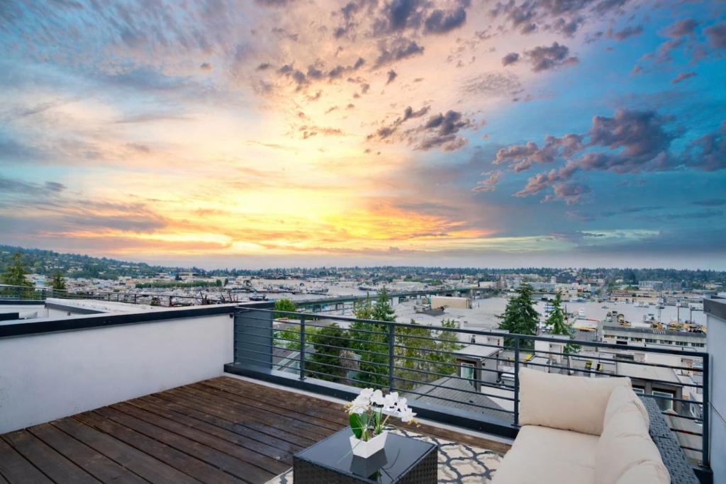 a balcony with a view of a city at 3BR Queen Anne House with Rooftop access in Seattle